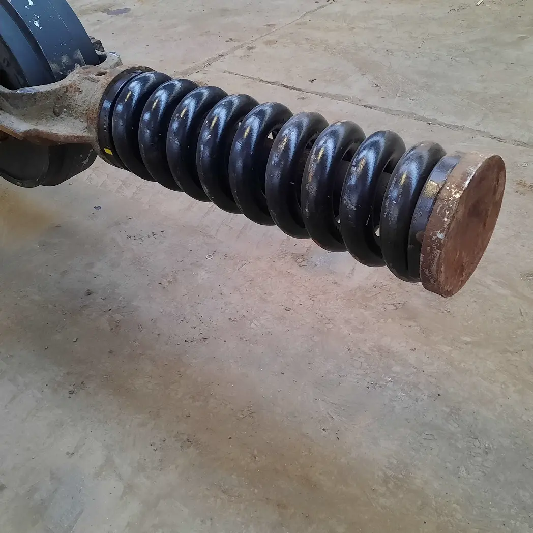 een spaninrichting van het rijwerk waarbij de veer vernieuwd is geweest.